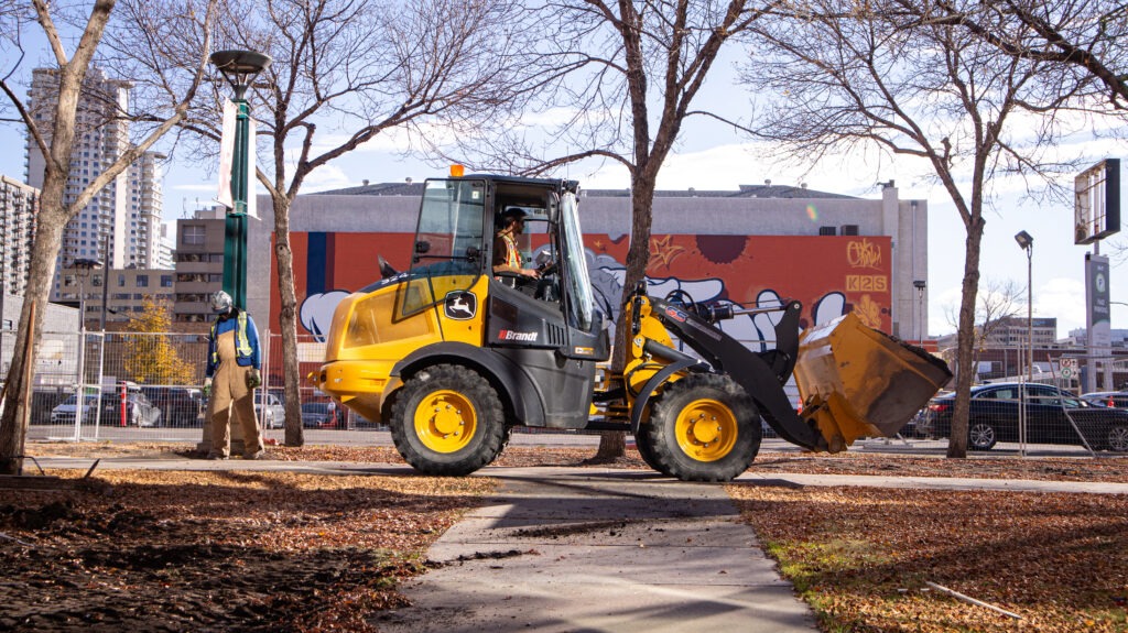 Dozer moving soil during land development and site grading work